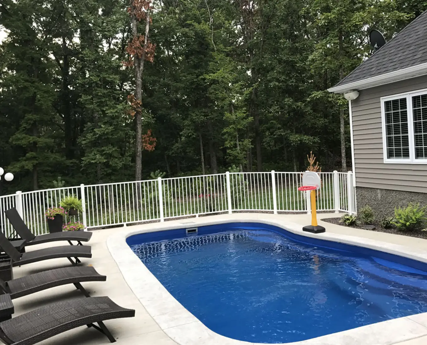 finished swimming pool installation project by Weilbacher Pools & Excavation in Columbia IL