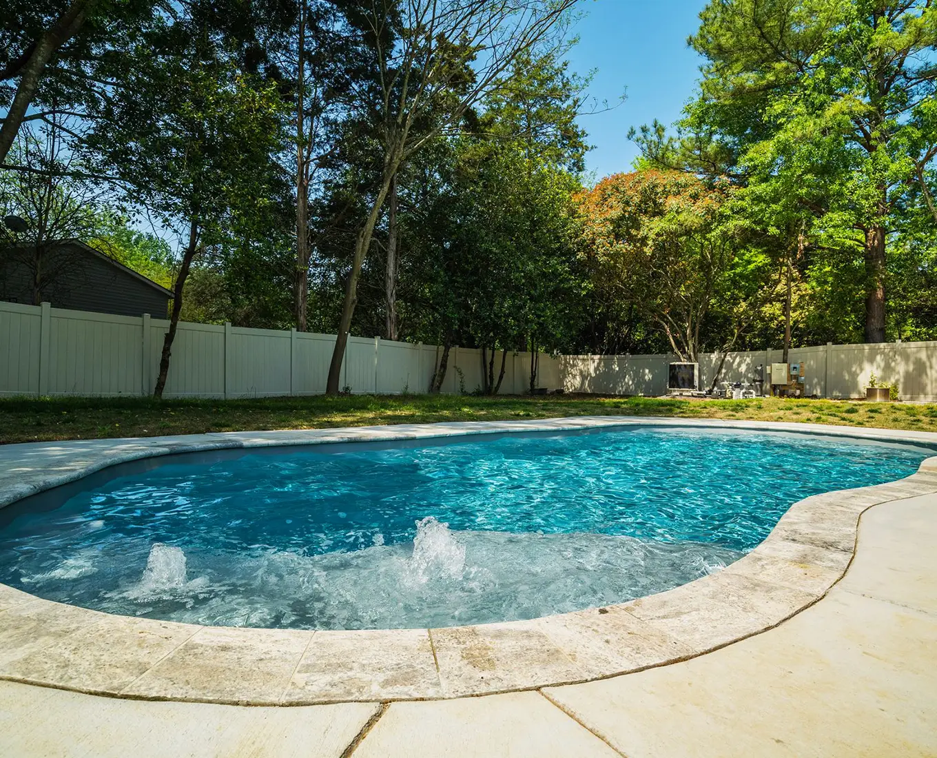 River Pools fiberglass pool installed in backyard