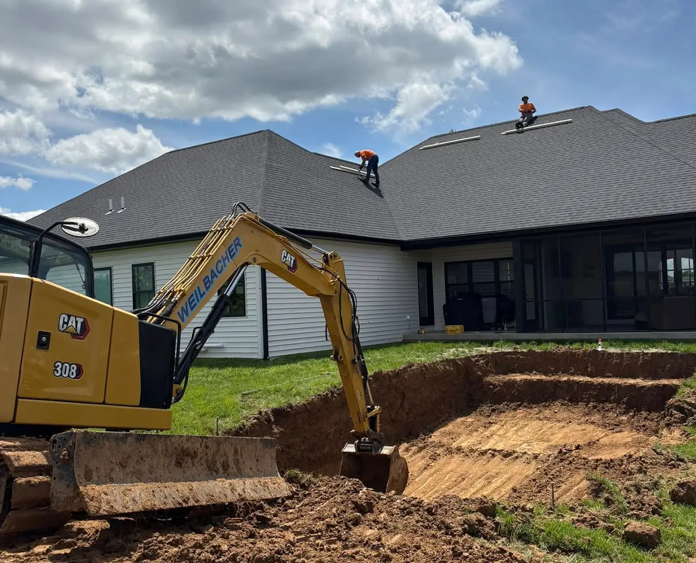 Pool excavation and site preparation services underway for a residential swimming pool project in Waterloo, IL.